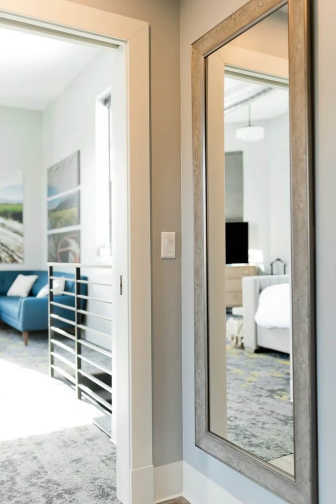 a white wooden framed glass door