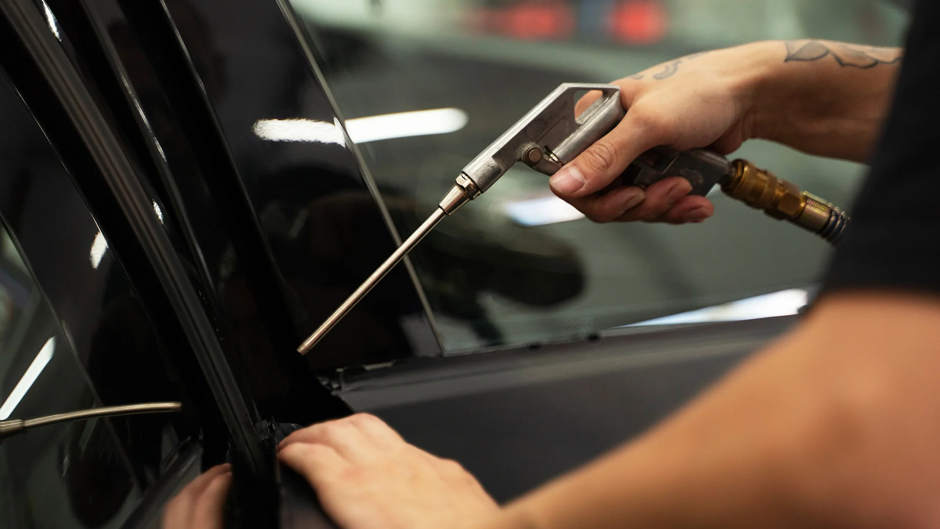 Auto service salon doign car wrapping