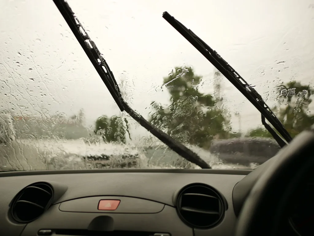 Windshield wipers from inside of car